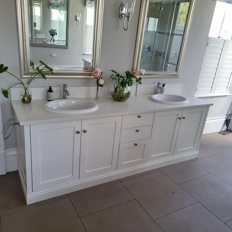 His & hers floor Duco painted Evora style with Dazzle Quartz tops. by DSK Woodwork